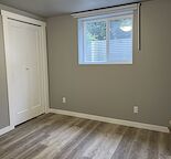 ROOM WITH PRIVATE BATHROOM IN BRAND-NEW RENOVATED LEGAL BASEMENT SUITE