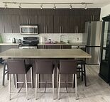 Trendy 17th Ave, oversized suite, furnished, parking, utilities, internet-cable — Lower Mount Royal, Calgary