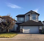 Bright 2-bedroom walkout in West Springs (separate entrance, kitchen, & laundry)