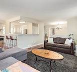 *Oversized heated double garage* Bright main floor unit