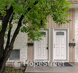 Updated 1-Bedroom Bi-Level Townhouse in Prime Varsity Location W/In-Suite Laundry!