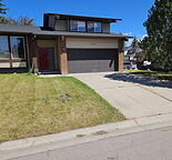 Beautiful 3 bedroom suite is located walking distance from fish creek park