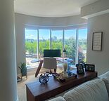 2000 sqf Executive Suite overlooking Bow River and Peace Bridge, ideal location