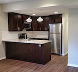 LEGAL ONE BEDROOM WALK OUT SUITE with INFLOOR HEATING