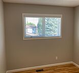Top floor bedroom in a split level house