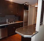 1 BED CONDO IN BANKVIEW CONDO- SOAKER TUB, IN-SUITE LAUNDRY, PARKING INCLUDED