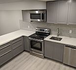 Basement suite w/ detached double wide garage for rent on Queensland drive
