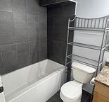 BRAND NEW RENOVATIONS + PET FRIENDLY LEGAL SUITE - $1500/MO UTILITIES INCLUDED!