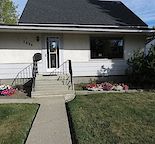 3-Bedrm INNER-CITY Main Floor Includes : Garage, Utilities & Private Laundry.