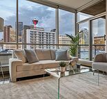 Bright & Modern 1 Bed + Den Condo | Downtown Views | Walk to City Centre