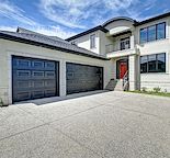 Executive custom estate Home with 5 bedrooms, 3.5 bathrooms, 3 car garage, and