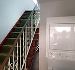 Renovated two bedroom top floor suite with private fenced yard