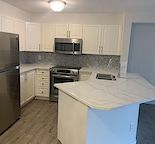 Renovated 2 bedrooms, 1 bathroom condo, spacious, close to LRT and Stoney Trail