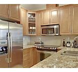 1235 sqft large corner unit with Downtown and Mountain views