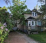 Bright Inner City Home w/ Huge Yard, Double Garage with Workshop & Driveway.