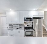 STUNNING 2 BEDROOM BASEMENT SUITE 5 MIN WALK TO FISH CREEK LRT AND PARK