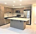 Luxurious adult (18+) 1-bed, 1-bath with in-suite laundry Condo in Kincora