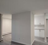 2BR townhome style condo across street from  Market mall