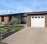 Beautifully Renovated Main Floor on Quiet Street w Utilities Included
