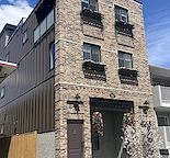 Timelessly styled townhome with roof-top patio; D/T views