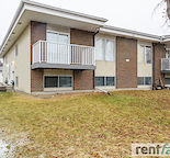 MINUTES FROM MT. ROYAL UNIVERSITY!!   Like New Bi- level corner unit in a 4 plex