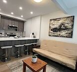 Modern Fully Furnished 2-Bedroom Suite — Utilities Included — East Hills Area