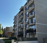 Live Steps from 17th Ave | Upgraded Suites & New Windows | Heat & Water Included — Beltline, Calgary