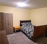 159 Marlyn Pl NE- Furnished Bedroom and living spaces