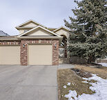 IMMACULATE EXECUTIVE 5 BEDROOM +DEN HOME BACKING ONTO FISH CREEK PARK