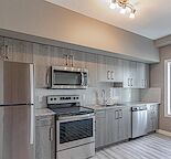 Stylish 1 Bed + Den Condo with Upgrades, In-Suite Laundry & Underground Parking!