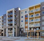 Stylish 1 Bed + Den Condo with Upgrades, In-Suite Laundry & Underground Parking!