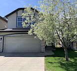 Bright 4-Bed Family Home with A/C in Calgary’s Vibrant West District