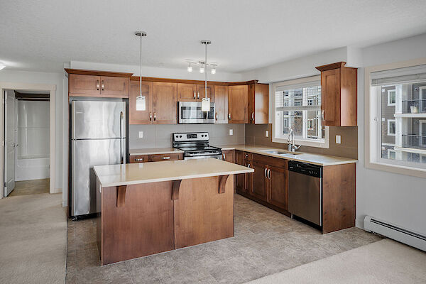 Bright & Beautiful 2 Bedroom + DEN Condo in Desirable SAGE HILL NW