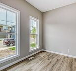New 3 Bedroom + Den Main Floor Unit in Beautiful Walden