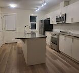 Stylish 2 Bedroom + 1 Flex room Townhouse with Rooftop Patio