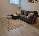 Modern, and tastefully fully furnished legal basement suite