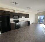 Cozy 2 Bedroom 2 Bathroom Apartment with Titled Parking!