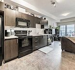 Cozy 2 Bedroom 2 Bathroom Apartment with Titled Parking!