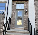 Quite  2 story, 2  bedrooms with ensuite and double attached garage