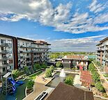 Resort Style Living! Stunning 1 Bedroom + Den Condo in Westman Village! (PC3430)