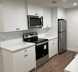 Beautiful Legal Suite in North West Calgary, 30 second walk from River Valley!