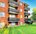 Large corner 1 bedroom apartment in Kensington, 2 minute walk to C-train & shops