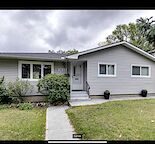 Green facing well maintained house at Charleswood community