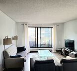 AUGUST FREE! Spacious Beltline 2BD 1BA condo, free garage parking, & storage.