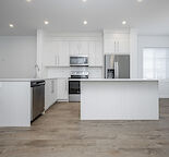 Modern Townhome w/ 3 Bedrooms + Den & Double Car Garage
