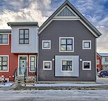 Modern 2 Bedroom Townhome with Developed Basement & Garage in Walden! (PC3446)