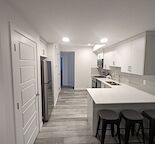 legal suite with separate thermostat plus 30%of utilities.