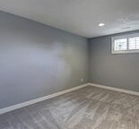 well lit clean well located 2 bedroom with single attached garage basement.