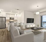 1 Bed + Den Townhome | Attached Garage + Titled Parking Stall