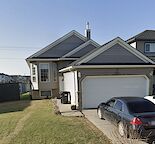 Beautiful bi-level home in heart of Saddle Ridge close to all amenities & LRT